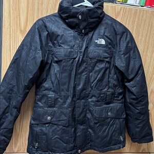 The North Face Dark Jacket with Subtle Pattern